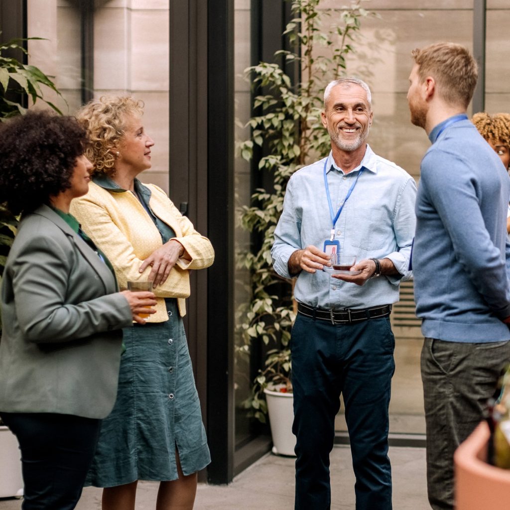 FundsUp investors sharing a conversation at a community gathering